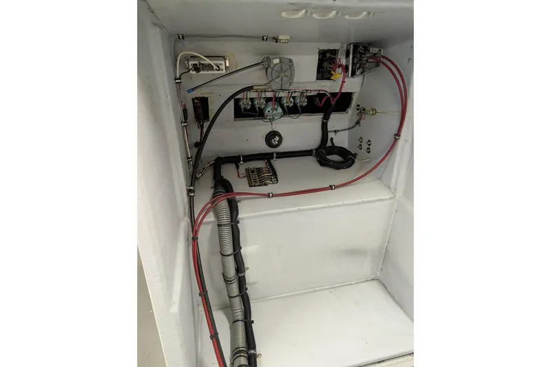 Slide: The Image of Electrical wiring and components inside a 1963 Rybovich 22 boat. - 12
