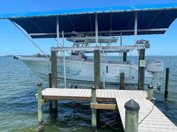 Slide: The Image of Robalo R302 Center Console 2023 - 2