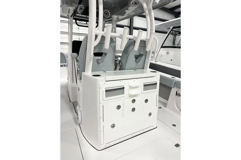 Slide: The Image of 2026 Sportsman Open 282 Center Console interior with seating and storage compartments. - 6