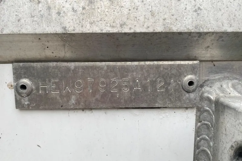 Slide: The Image of HIN plate on 2021 Hewescraft 210 Sea Runner ET Hardtop boat. - 5