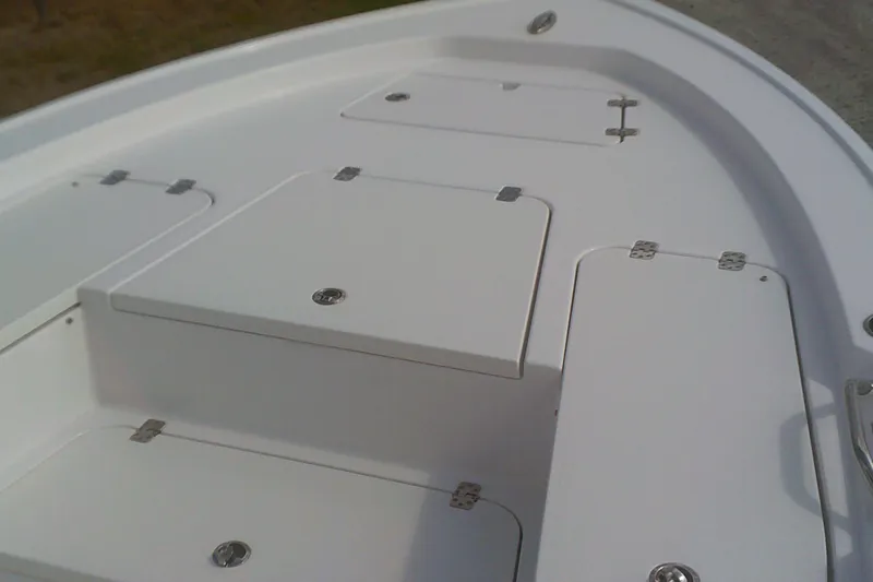 Slide: The Image of 2025 Sportsman Masters 227 Bay Boat deck with storage compartments. - 4