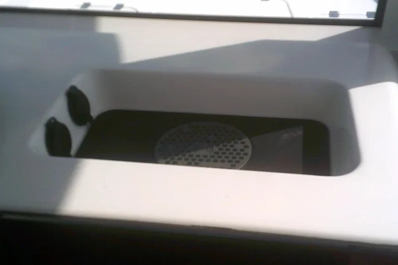 Slide: The Image of Livewell compartment on 2025 Sportsman Masters 227 Bay Boat. - 8