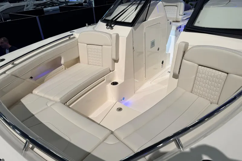 Slide: The Image of Luxurious seating area on 2026 Scout 288 Dorado boat, featuring elegant white upholstery. - 3