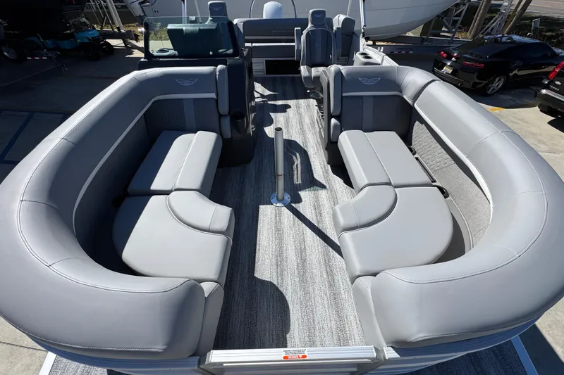 Slide: The Image of 2026 Bennington 22 MSB pontoon boat with spacious gray seating and modern design. - 16