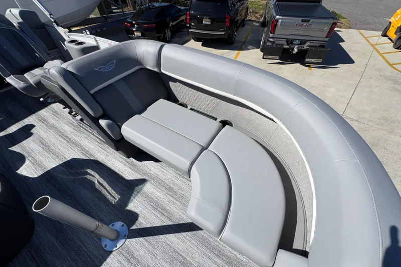 Slide: The Image of 2026 Bennington 22 MSB boat interior with luxurious gray seating and modern design. - 19