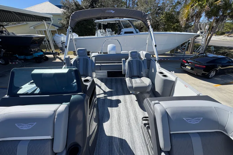 Slide: The Image of 2026 Bennington 22 MSB pontoon boat with sleek gray interior and modern seating. - 20