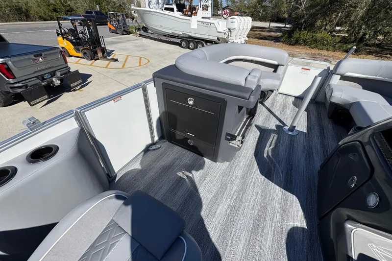 Slide: The Image of 2026 Bennington 22 MSB pontoon boat interior with gray seating and flooring. - 25