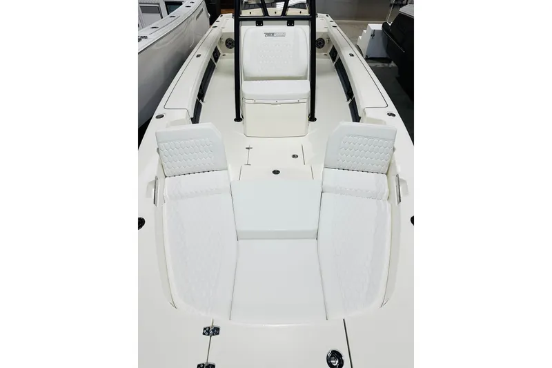 Slide: The Image of 2026 Pathfinder 2600 TRS boat interior with white cushioned seating and sleek design. - 10