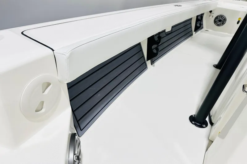 Slide: The Image of 2026 Pathfinder 2600 TRS boat interior with sleek white seating and black accents. - 12