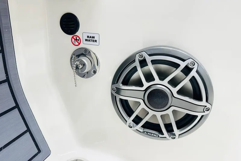 Slide: The Image of 2026 Pathfinder 2600 TRS boat speaker and raw water outlet detail. - 13