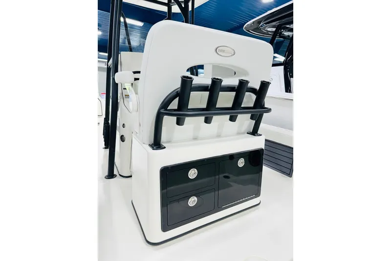 Slide: The Image of 2026 Pathfinder 2600 TRS boat interior with rod holders and storage compartments. - 5