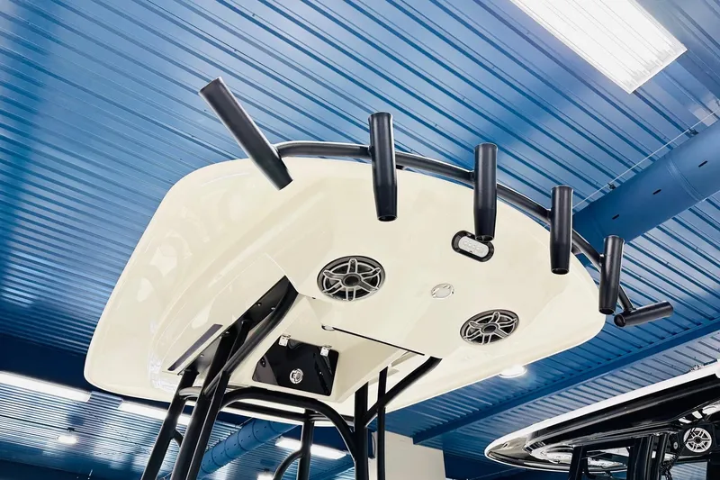 Slide: The Image of 2026 Pathfinder 2600 TRS boat top view with rod holders and speakers. - 6