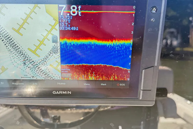 Slide: The Image of Garmin fishfinder display on Parker 2100 Special Edition boat, showing depth and sonar data. - 29