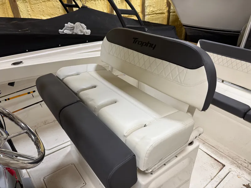 Slide: The Image of Bayliner TROPHY CC24 2023 boat seat with cushioning. - 6