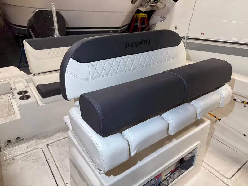 Slide: The Image of Bayliner TROPHY CC24 2023 boat seat with cushioning. - 7