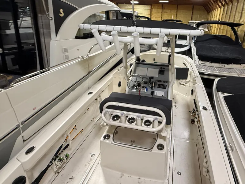 Slide: The Image of Interior view of a 2023 Bayliner TROPHY CC24 boat in storage. - 8