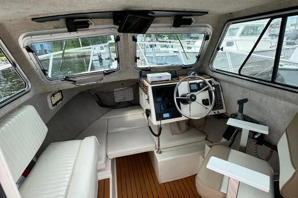 Slide: The Image of Parker Marine 2320 SL Sport Cabin 2009 - 9
