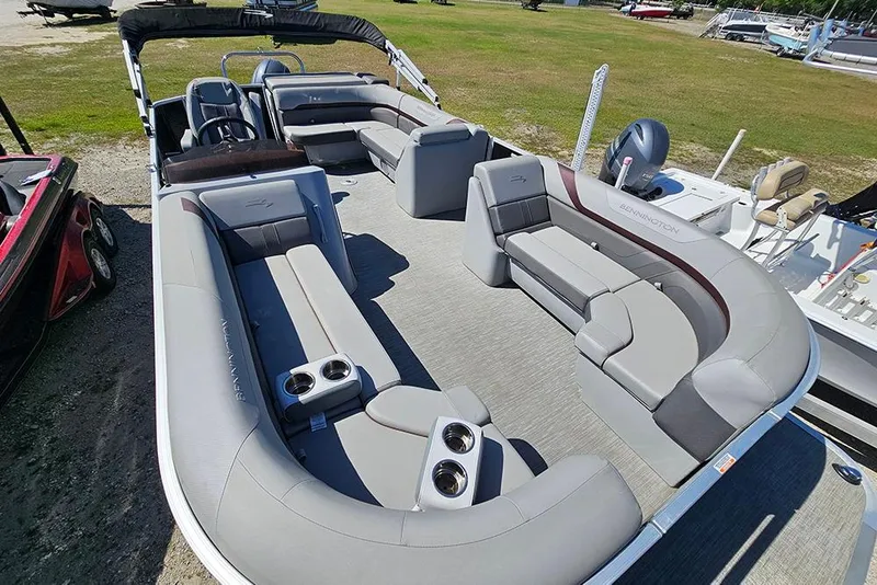 Slide: The Image of 2023 Bennington 21 SLX pontoon boat with spacious seating and modern design. - 20