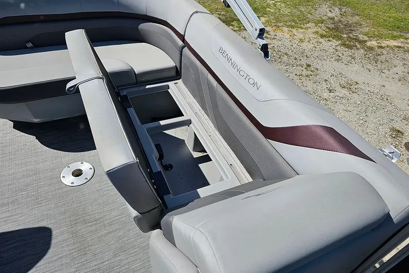 Slide: The Image of 2023 Bennington 21 SLX boat interior with open storage compartment. - 24