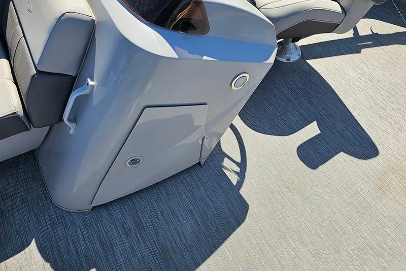 Slide: The Image of 2023 Bennington 21 SLX boat interior with gray seating and flooring. - 30