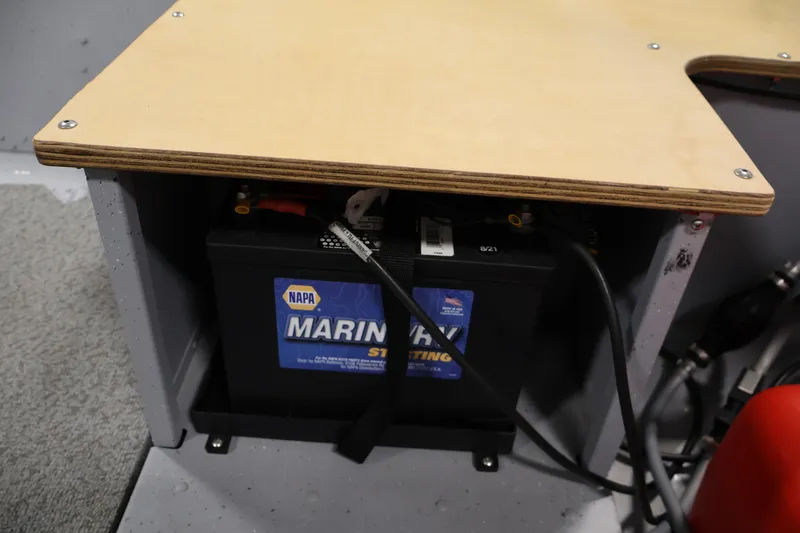 Slide: The Image of Battery compartment in 2022 Lund SSV-16 Tiller boat with NAPA Marine battery. - 15