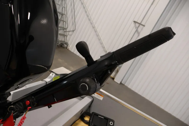 Slide: The Image of 2022 Lund SSV-16 Tiller handle in a garage setting. - 19