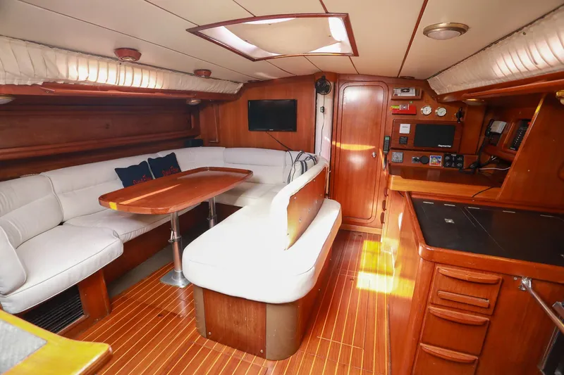 Slide: The Image of Cockpit of 1988 Grand Soleil 46 Jezequel sailboat with wooden accents and steering wheel. - 10