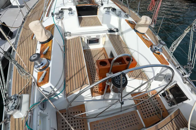 Slide: The Image of Cockpit of 1988 Grand Soleil 46 Jezequel sailboat with wooden deck and steering wheel. - 7