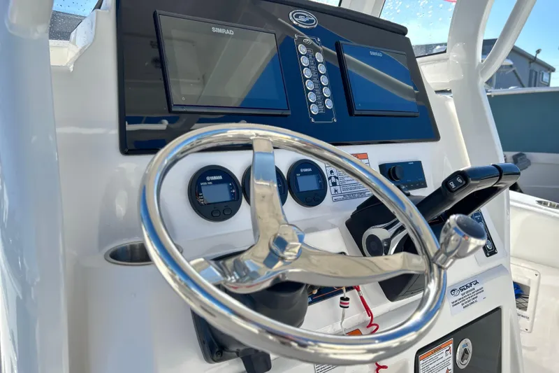 Slide: The Image of 2024 Sea Fox 268 Commander helm with Simrad displays and Yamaha controls. - 13