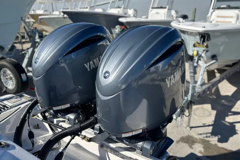 Slide: The Image of Twin Yamaha outboard engines on a 2024 Sea Fox 268 Commander boat. - 21