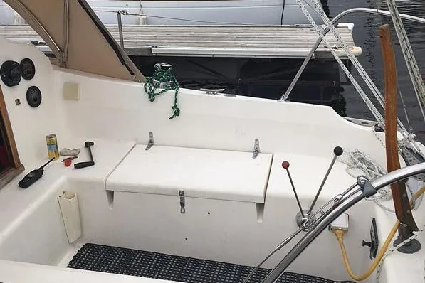 Slide: The Image of Cockpit of a 1975 Mirage Yachts 27 sailboat with steering wheel and controls. - 5