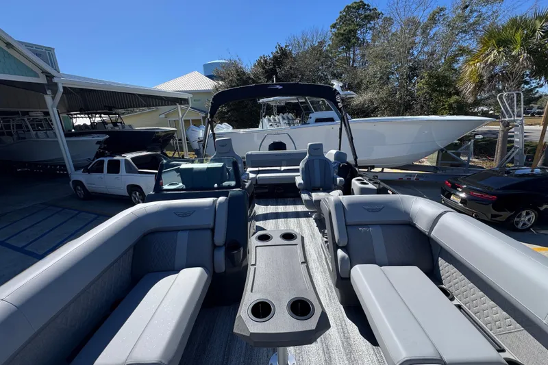 Slide: The Image of 2026 Bennington 22 MSB pontoon boat with spacious seating and modern design. - 16