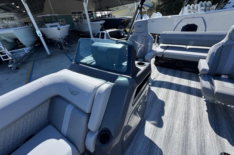 Slide: The Image of 2026 Bennington 22 MSB pontoon boat interior with luxurious seating and modern design. - 19