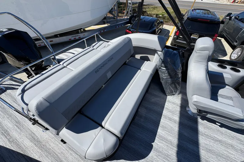 Slide: The Image of 2026 Bennington 22 MSB pontoon boat with luxurious gray seating and modern design. - 26