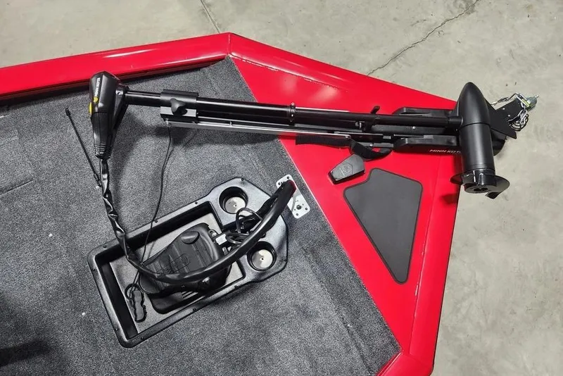 Slide: The Image of 2026 Tracker Pro Team 195 boat deck with trolling motor and foot pedal. - 7