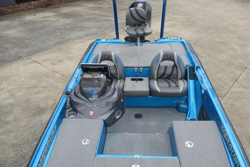 Slide: The Image of 2020 Bass Cat Puma FTD boat interior with gray seats and blue accents. - 6