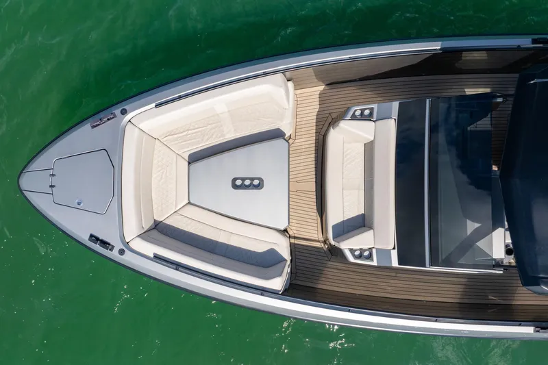 Slide: The Image of Aerial view of 2022 Vanquish VQ40 luxury boat with sleek design and spacious seating. - 13