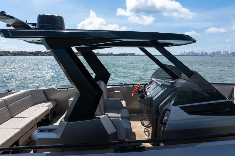 Slide: The Image of 2022 Vanquish VQ40 luxury yacht interior with modern design on open water. - 26