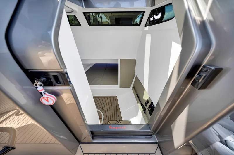 Slide: The Image of Interior view of 2022 Vanquish VQ40 yacht, showcasing modern design and sleek finishes. - 29