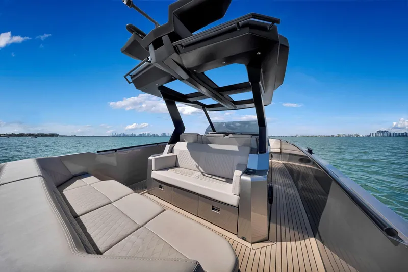 Slide: The Image of Luxurious 2022 Vanquish VQ40 yacht interior with sleek seating and modern design on open water. - 43