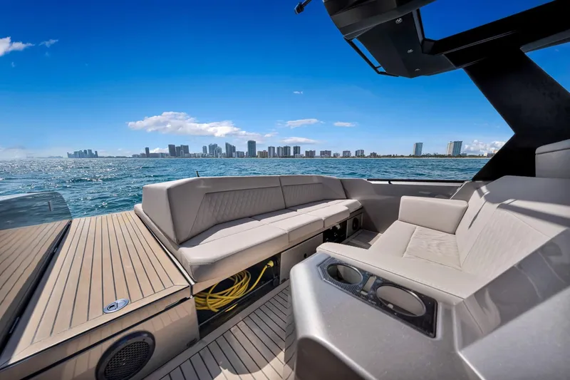 Slide: The Image of Luxurious 2022 Vanquish VQ40 yacht interior with city skyline view. - 44