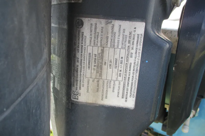 Slide: The Image of Label on 2012 Stumpknocker 17 SPORT boat engine, detailing emissions and specifications. - 10