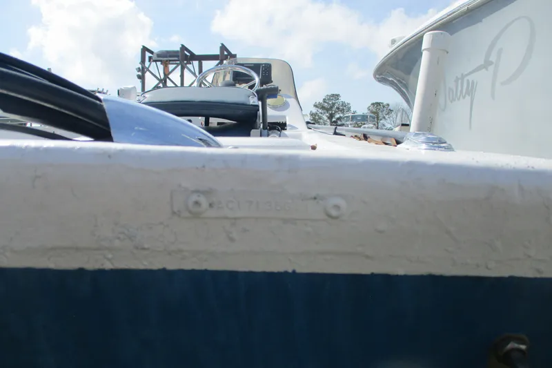 Slide: The Image of 2012 Stumpknocker 17 SPORT boat, close-up view of the deck and steering wheel. - 11