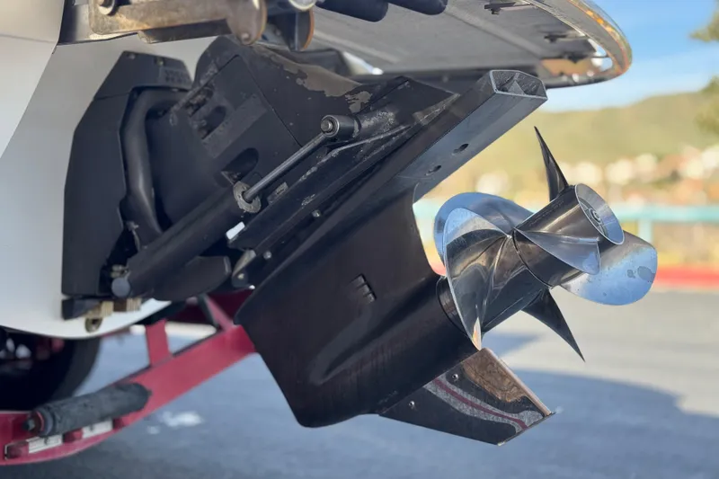 Slide: The Image of 2004 Cobalt 240SD boat propeller and outdrive close-up, showcasing marine engineering. - 10