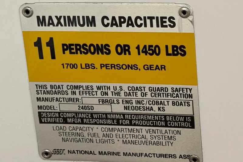 Slide: The Image of Capacity label for 2004 Cobalt 240SD boat: 11 persons or 1450 lbs. - 36