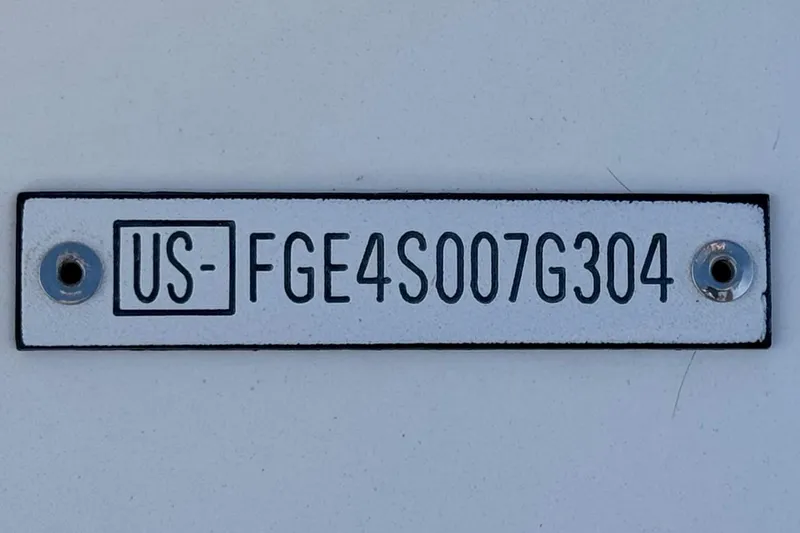 Slide: The Image of 2004 Cobalt 240SD identification plate with serial number US-FGE4S007G304. - 38