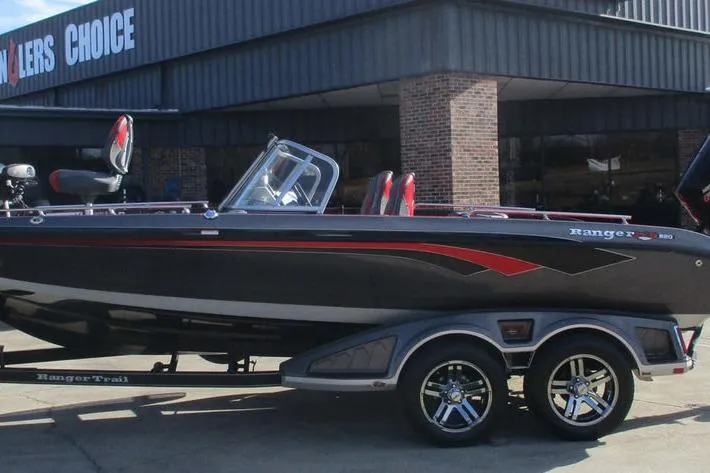 Slide: The Image of 2020 Ranger 620FS Cup-Equipped boat on trailer outside dealership. - 1