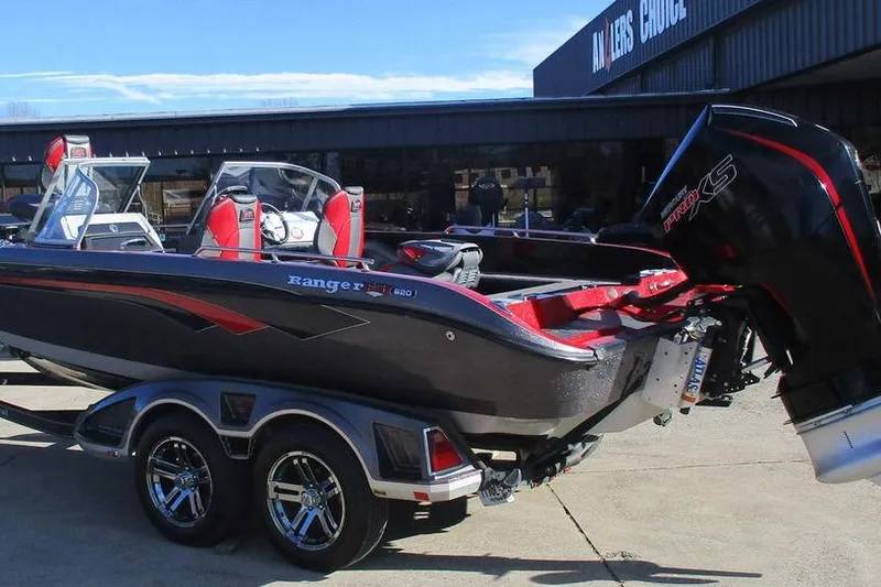 Slide: The Image of 2020 Ranger 620FS Cup-Equipped boat on trailer, featuring sleek design and powerful engine. - 2