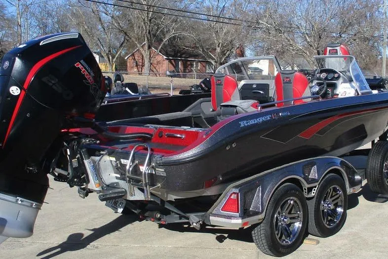 Slide: The Image of 2020 Ranger 620FS Cup-Equipped boat with powerful outboard motor on trailer. - 3