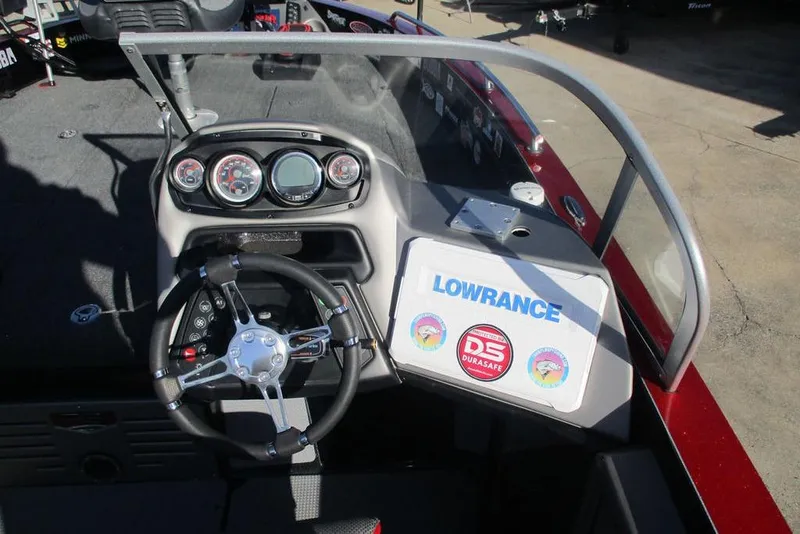 Slide: The Image of 2020 Ranger 620FS Cup-Equipped boat dashboard with steering wheel and Lowrance electronics. - 5